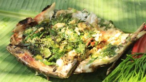Lao grilled fish stuffed with herbs